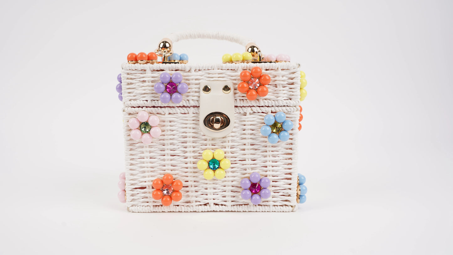 Dylan Daisy Wicker Tote, a staple for curated boutique fashion and chic affordable style available at your Womens Boutique West Palm Beach, FL.