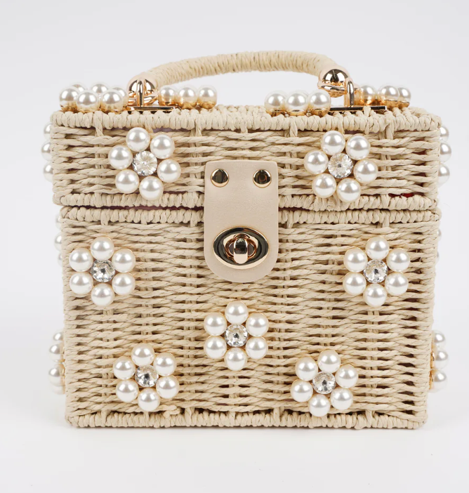 Dylan Daisy Wicker Tote, a staple for curated boutique fashion and chic affordable style available at your Womens Boutique West Palm Beach, FL.