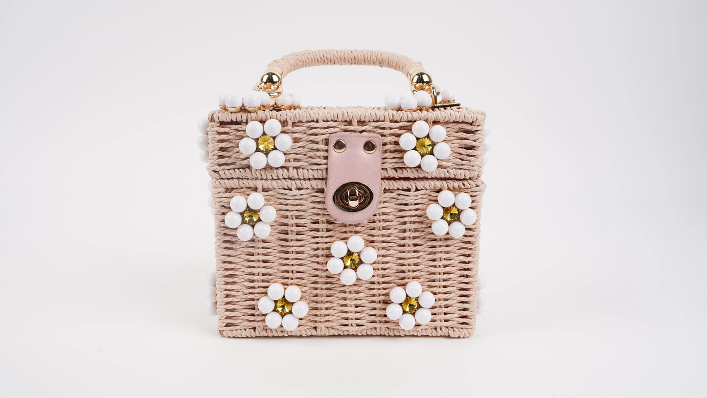 Dylan Daisy Wicker Tote, a staple for curated boutique fashion and chic affordable style available at your Womens Boutique West Palm Beach, FL.