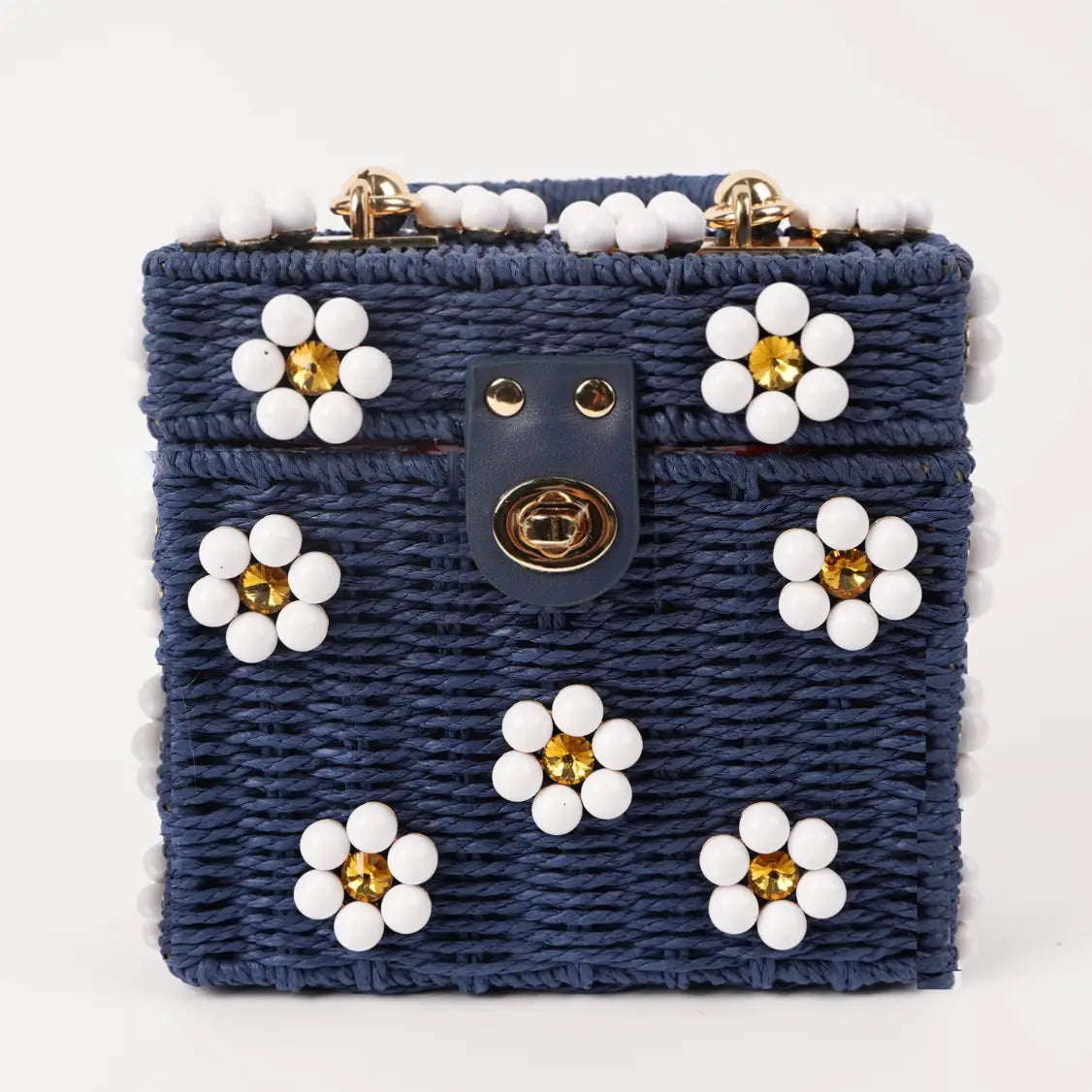 Dylan Daisy Wicker Tote, a staple for curated boutique fashion and chic affordable style available at your Womens Boutique West Palm Beach, FL.