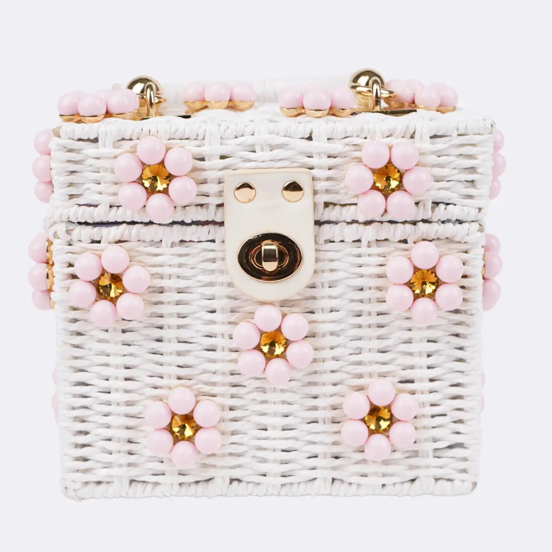 Dylan Daisy Wicker Tote, a staple for curated boutique fashion and chic affordable style available at your Womens Boutique West Palm Beach, FL.
