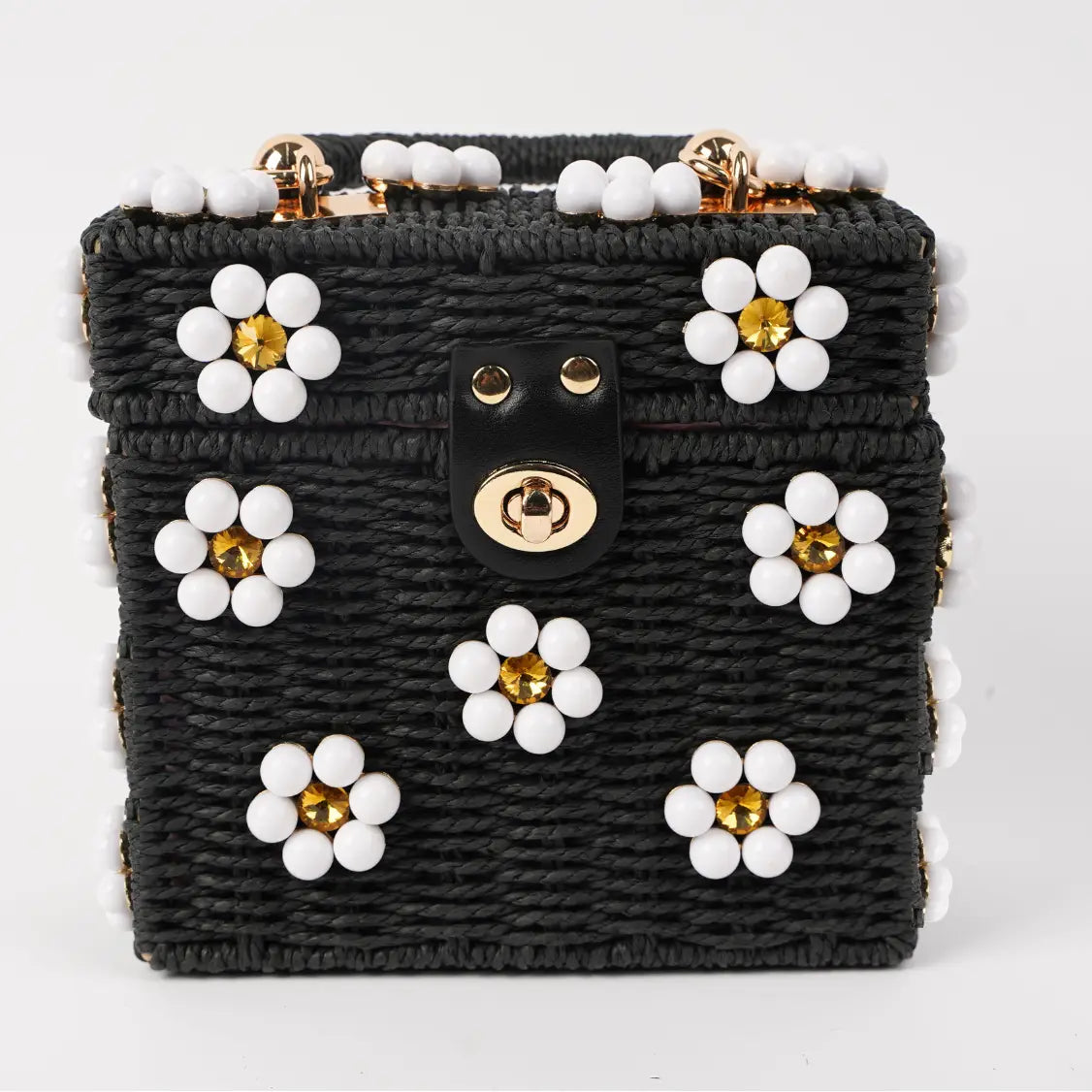 Dylan Daisy Wicker Tote, a staple for curated boutique fashion and chic affordable style available at your Womens Boutique West Palm Beach, FL.
