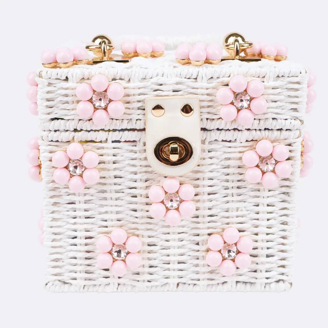 Dylan Daisy Wicker Tote, a staple for curated boutique fashion and chic affordable style available at your Womens Boutique West Palm Beach, FL.