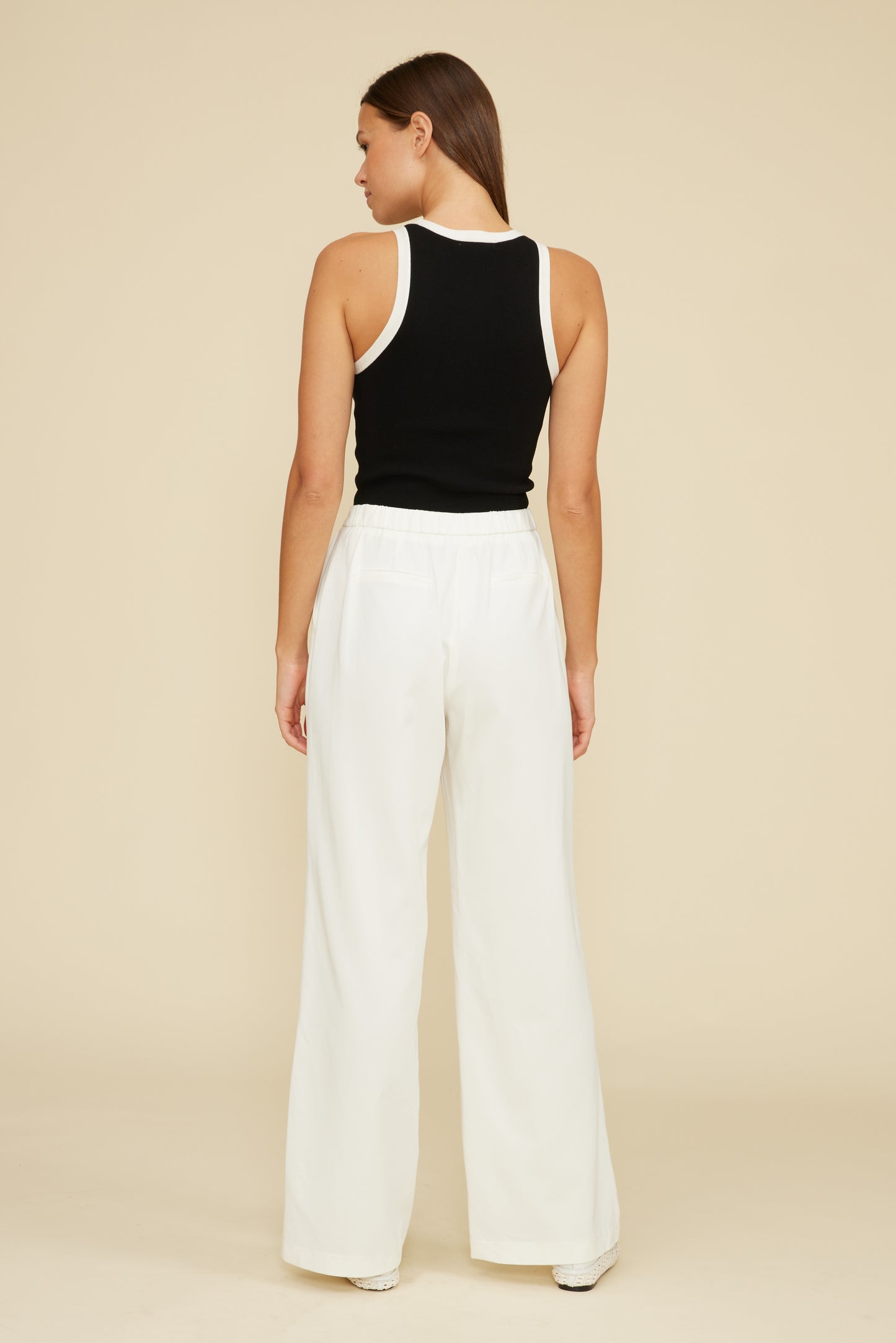 Joy Cutaway Tank Top Black with White Trim, a perfect addition to your curated boutique fashion for chic affordable style at our Womens Boutique West Palm Beach, FL