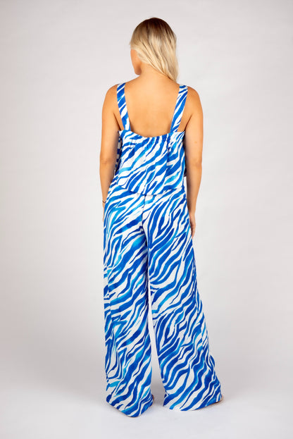 Blue zebra print crop top
One shoulder animal print top
Bold zebra print tank top
Abstract stripe summer top
Blue and white printed top
Statement crop top for women
Trendy summer going out top
Asymmetrical strap top
Eye-catching zebra pattern tank
Resort wear matching set top
Blue festival outfit idea
Strappy crop top for vacation
Vibrant animal print top
Co-ord set zebra print top
Lightweight sleeveless top for summer