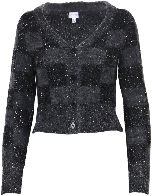 Black textured cardigan with buttons on a white background, a staple for curated boutique fashion and chic affordable style available at your Womens Boutique West Palm Beach, FL.
