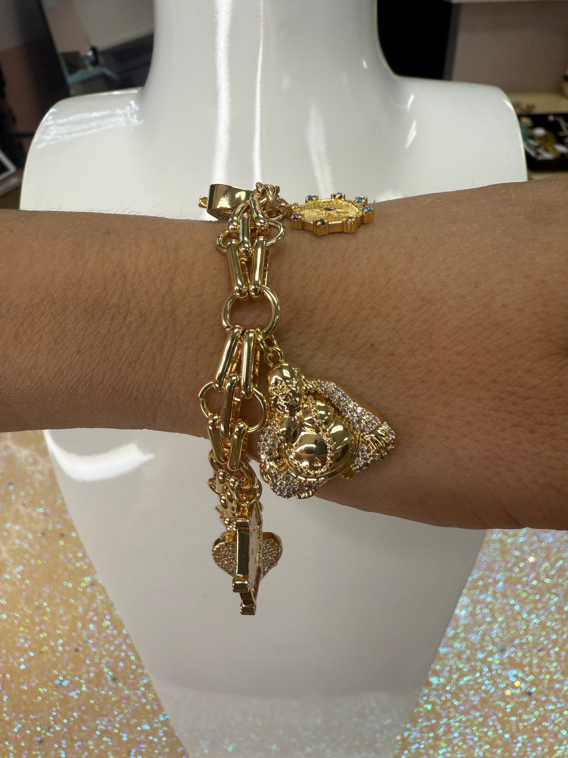 Add a touch of sparkle and fun to your wrist with this charm bracelet featuring a large lobster claw clasp adorned with dazzling cubic zirconia stones. Its playful design makes it perfect for mixing and matching with your favorite charms, adding personality and shine to any outfit. Durable and eye-catching, this bracelet is sure to become your new go-to accessory for everyday adventures. A staple for curated boutique fashion and chic 
style available at your Women's Boutique West Palm Beach, FL
CS101