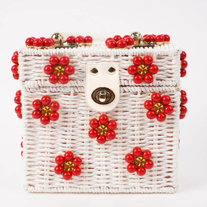 Dylan Daisy Wicker Tote,  a staple for curated boutique fashion and chic affordable style available at your Womens Boutique West Palm Beach, FL.