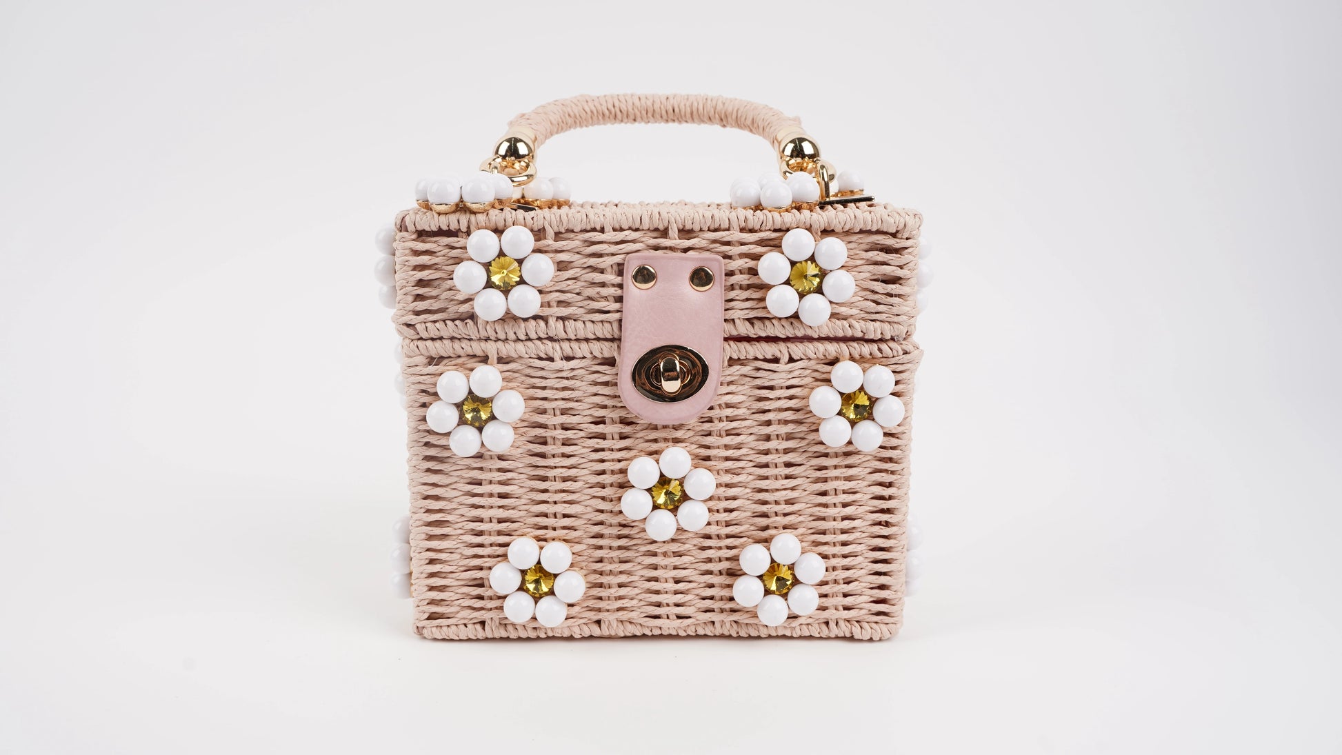 Dylan Daisy Wicker Tote,  a staple for curated boutique fashion and chic affordable style available at your Womens Boutique West Palm Beach, FL.