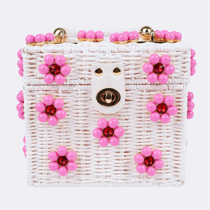 Dylan Daisy Wicker Tote,  a staple for curated boutique fashion and chic affordable style available at your Womens Boutique West Palm Beach, FL.