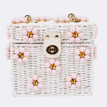 Dylan Daisy Wicker Tote,  a staple for curated boutique fashion and chic affordable style available at your Womens Boutique West Palm Beach, FL.
