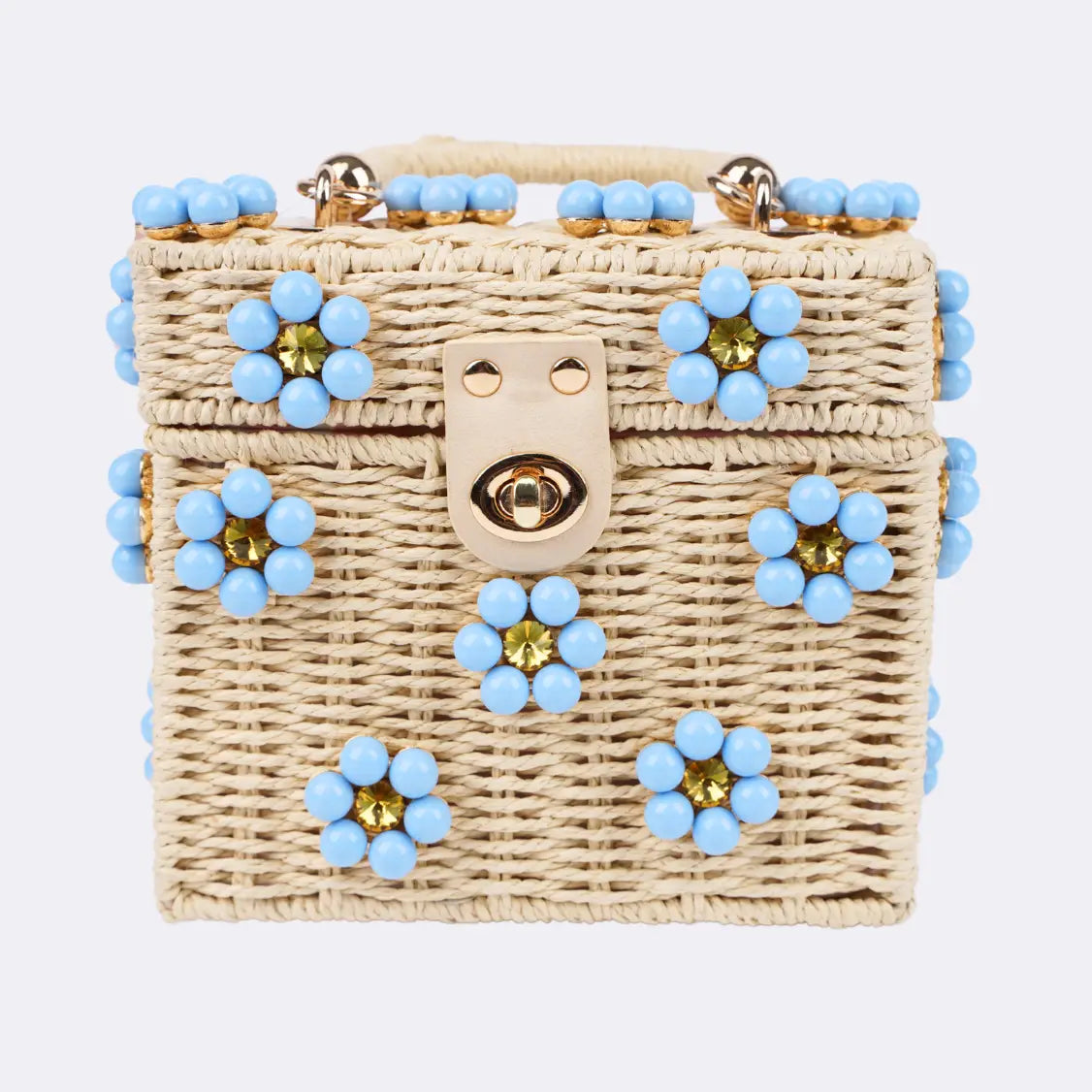 Dylan Daisy Wicker Tote,  a staple for curated boutique fashion and chic affordable style available at your Womens Boutique West Palm Beach, FL.