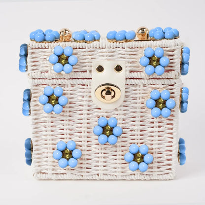 Dylan Daisy Wicker Tote,  a staple for curated boutique fashion and chic affordable style available at your Womens Boutique West Palm Beach, FL.