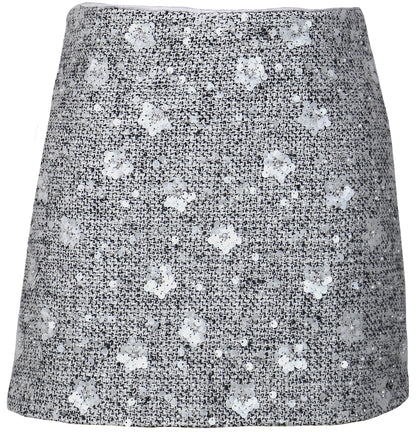 Short skirt with a pattern on a white background, a staple for curated boutique fashion and chic affordable style available at your Womens Boutique West Palm Beach, FL.
