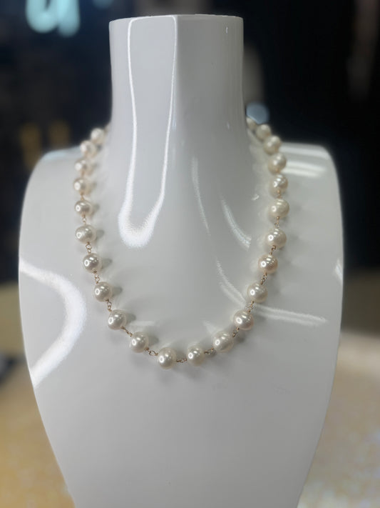 Add a touch of whimsy to your look with this freshwater pearl necklace, featuring a sparkling large CZ lobster claw clasp. Its playful charm and elegant pearls make it perfect for brightening up any outfit, day or night. A staple for curated boutique fashion and chic affordable style available at your Women's Boutique West Palm Beach, FL