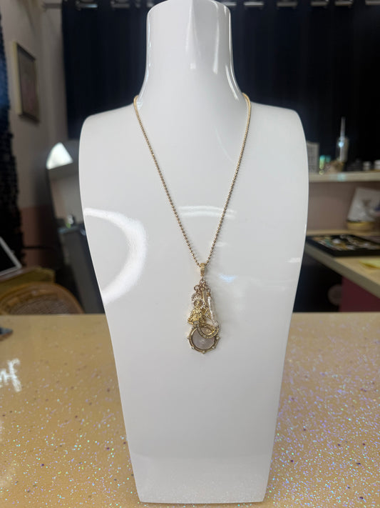 Add a touch of sparkle and fun to any outfit with this Gold Beaded Chain Necklace featuring charming accents. Its playful design combines delicate gold beads with whimsical charms, making it the perfect accessory to brighten your day and spark conversations wherever you go. A staple for curated boutique fashion and hic affordable style available at your Women's Boutique West Palm Beach, FL

CS100