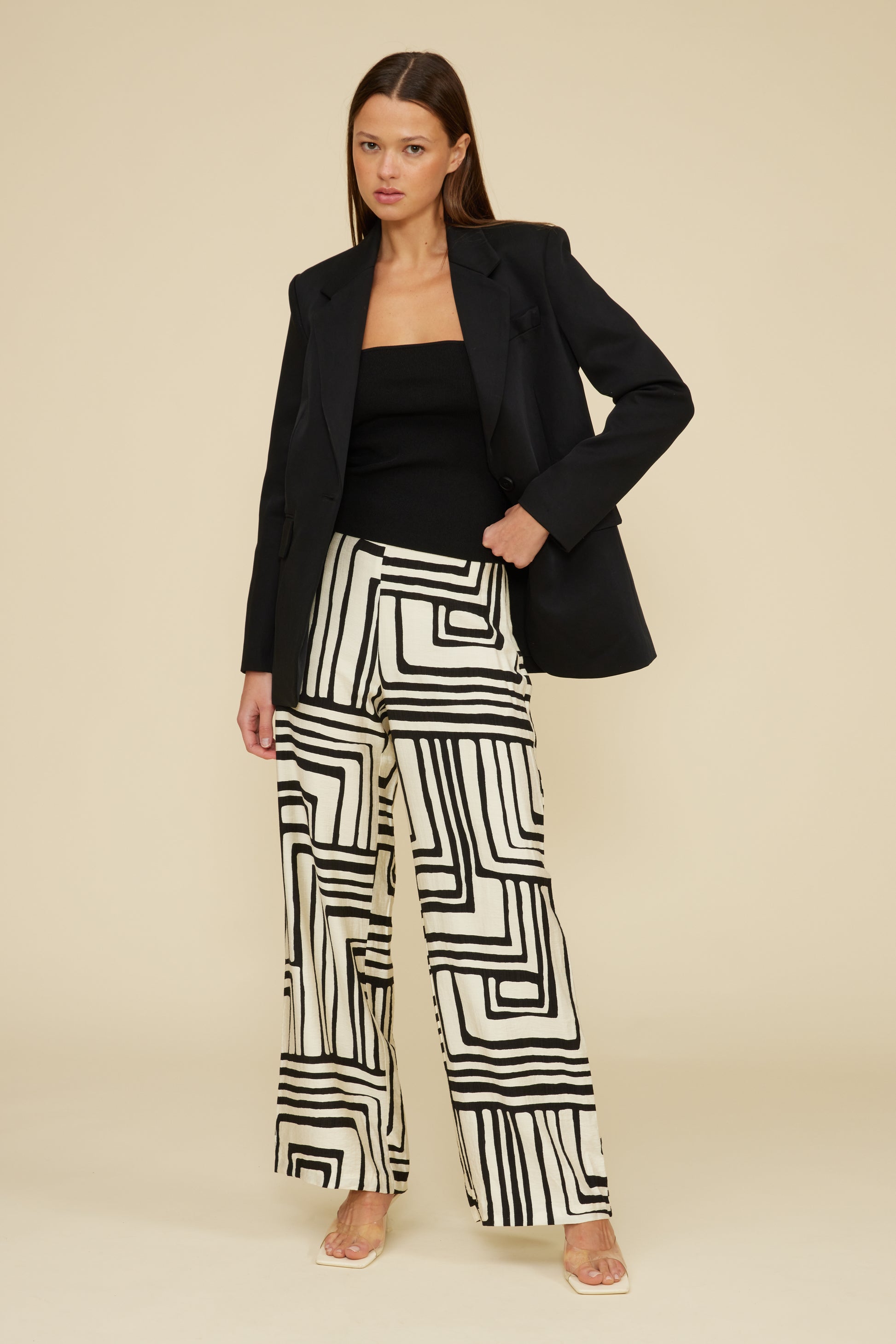 Helen Black and White Printed Wide-Leg Pants, a staple for curated boutique fashion and chic affordable style available at your Womens Boutique West Palm Beach, FL.