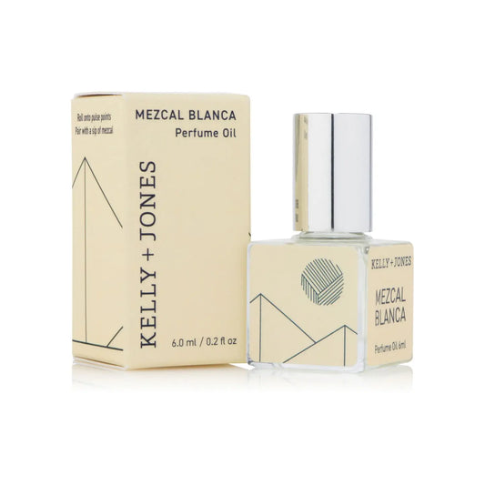 Kelly + Jones Mezcal Blanca perfume oil packaging on a white background. a staple for curated boutique fashion and chic affordable style available at your Womens Boutique West Palm Beach, FL.
