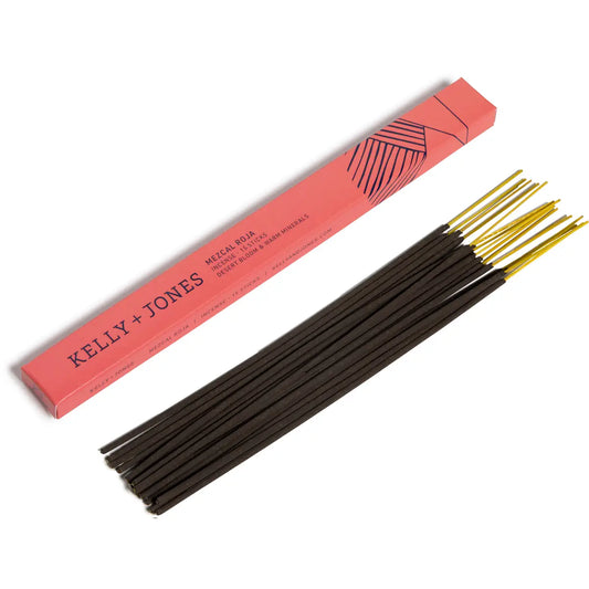 Incense sticks with a pink packaging box labeled 'Kelly + Jones' on a white background. a staple for curated boutique fashion and chic affordable style available at your Womens Boutique West Palm Beach, FL.
