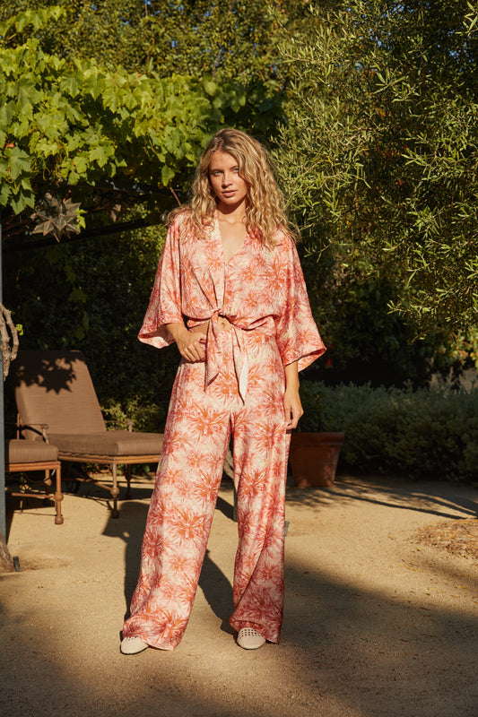 Women's floral printed pant
Lightweight summer pant
Orange and pink floral pant
Casual chic pants
Boho floral pants
Printed pants
Flowy spring print for women
Resort wear women's pants
