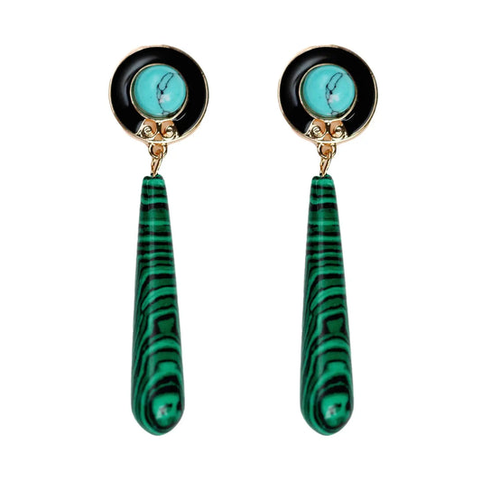 Pair of earrings with green marbled drops and turquoise stones on a white background